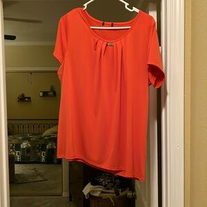 Orange knit blouse